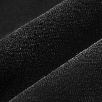 Textured black fabric close-up showcasing premium quality for sweatpants collection.